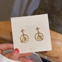 Pendientes Simples Y Modernos De La Moda Coreana De La Estrella De Cuatro Puntas Del Ópalo De La Aguja De Plata 925 sku image 1