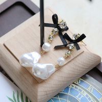 White Special-shaped Pearl Bow Long Stud Earrings main image 4