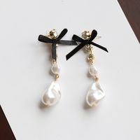 White Special-shaped Pearl Bow Long Stud Earrings main image 6