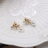 Knotted Bowknot Asymmetrical Stud Earrings main image 1