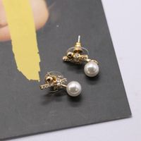 Knotted Bowknot Asymmetrical Stud Earrings main image 6