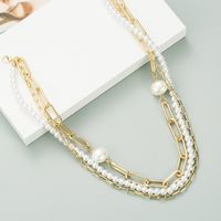 New Fashion Simple Multi-layer Metal Buckle Short Shiny Pearl Necklace main image 4