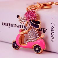 Kuxi Ornament Rhinestone Cartoon Cycling Puppy Car Key Ring Women's Bag Accessories Animal Metal Pendant main image 3