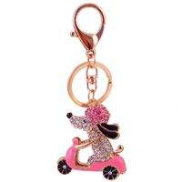 Kuxi Ornament Rhinestone Cartoon Cycling Puppy Car Key Ring Women's Bag Accessories Animal Metal Pendant main image 6