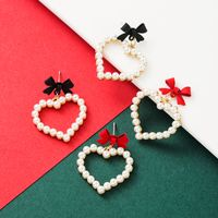 Alloy Spray Paint Bow Love Heart-shaped Imitation Pearl Earrings main image 2