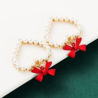 Alloy Spray Paint Bow Love Heart-shaped Imitation Pearl Earrings main image 5