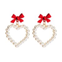 Alloy Spray Paint Bow Love Heart-shaped Imitation Pearl Earrings main image 6