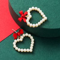 Alloy Spray Paint Bow Love Heart-shaped Imitation Pearl Earrings sku image 1