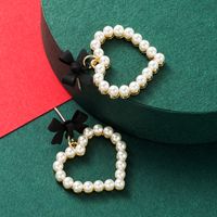 Alloy Spray Paint Bow Love Heart-shaped Imitation Pearl Earrings sku image 2