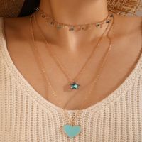 Collier Diamant Bleu Pentagramme En Forme De Cœur Avec Pompon Bleu Étoile main image 1