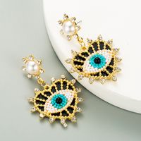 Exquisite Devil's Eyes Diamond-studded Pearl Heart-shaped Earrings main image 3