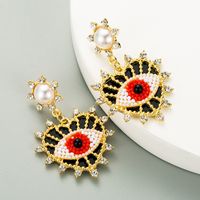 Exquisite Devil's Eyes Diamond-studded Pearl Heart-shaped Earrings main image 4