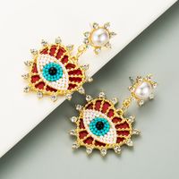 Exquisite Devil's Eyes Diamond-studded Pearl Heart-shaped Earrings main image 5