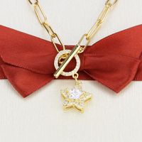 Collar De Estrella De Cinco Puntas Con Diamantes Bañados En Oro main image 3
