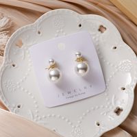 Korean  Simple  Pearl Bow Earrings main image 4