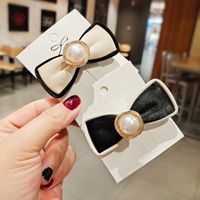 Pu Leather Simple Black And White Bow Pearl Hair Clip main image 2