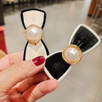 Pu Leather Simple Black And White Bow Pearl Hair Clip main image 5