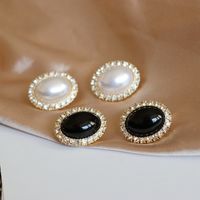 Oval White Black Diamond Earrings main image 1