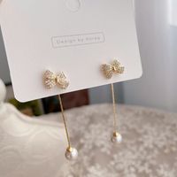 Korean New Simple Pearl Bowknot Earrings main image 4