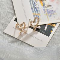 Korean  Irregular Hollow Love Pearl Earrings main image 1