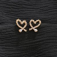 Korean  Irregular Hollow Love Pearl Earrings main image 4