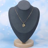 Europe Et En Amérique Croix Frontière Nouvelle Arrivée Micro Strass Lune Soleil Pendentif Collier Vide Couleur Préserver Hip Hop Inoxydable Acier Collier main image 4