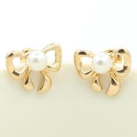 Simple Bow Earrings Gold-plated Silver Inlaid Pearl Earrings 8-shaped Bow Tie Earrings Wholesale main image 1