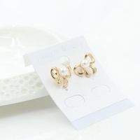 Simple Bow Earrings Gold-plated Silver Inlaid Pearl Earrings 8-shaped Bow Tie Earrings Wholesale main image 4