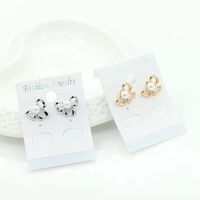 Simple Bow Earrings Gold-plated Silver Inlaid Pearl Earrings 8-shaped Bow Tie Earrings Wholesale main image 3