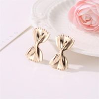 Mode Nouveau Boucles D'oreilles Creative Bowknot En Métal Boucles D'oreilles Doux Artistique Pliant Bonbons Wrap Femmes De Boucles D'oreilles En Gros main image 4