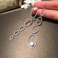 Fashion Asymmetric Gradient Oval Earrings Female Long Tassel S925 Silver Pearl Earrings main image 1