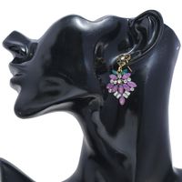 Style Européen Et Américain Exagérée Alliage De Diamant Fleur Boucles D'oreilles Femmes Rétro Casual Couleur Strass Longues Boucles D'oreilles Croix-frontière Fournir main image 6