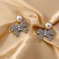 New Baroque Flash Diamond Elegant Pearl Bow 925 Silver Pin Earrings Wholesale sku image 1