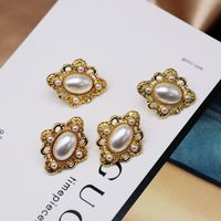 White Engraved Pattern Hollow Pearl Ear Clips 925 Silver Pin Earrings Oval Ear Clips main image 4