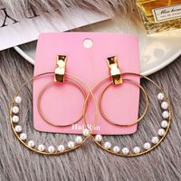 New Size Circle Winding Pearl Ear Ring Creative Retro Simple Gold Earrings For Women Wholesale main image 3