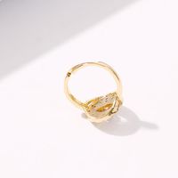 New Fashion Devil&#39;s Eye Micro-inserted Zircon Hollow Round Adjustable Ring Wholesale main image 5
