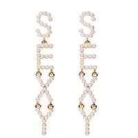 The New Exaggerated Pearl English Alphabet Earrings Wholesale main image 1