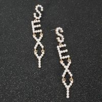 The New Exaggerated Pearl English Alphabet Earrings Wholesale main image 4