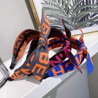 Korean New Fashion Sports And Leisure Wind Letter Logo Wide-brimmed Bowknot Cheap Headband Wholesale main image 3