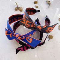 Korean New Fashion Sports And Leisure Wind Letter Logo Wide-brimmed Bowknot Cheap Headband Wholesale main image 4