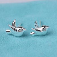 New Simple Flying Pigeon Earrings Alloy Electroplated Three-dimensional Peace Pigeon Earrings Wholesale main image 4