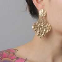 New Metal Flower Earrings Creative Retro Simple Golden Alloy Four Leaf Earrings Wholesale main image 1
