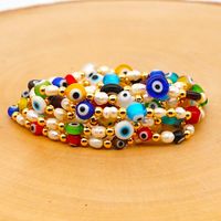 New Simple Baroque Pearl Glazed Evil Eye Ethnic Style Gold Bead Bracelet For Women Wholesale main image 1