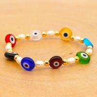 New Simple Baroque Pearl Glazed Evil Eye Ethnic Style Gold Bead Bracelet For Women Wholesale main image 4