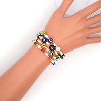 New Simple Baroque Pearl Glazed Evil Eye Ethnic Style Gold Bead Bracelet For Women Wholesale main image 3