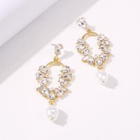 Korean New Long Pearl Pendant Earrings Fashion Geometric Hollow Alloy Diamond Earrings main image 4