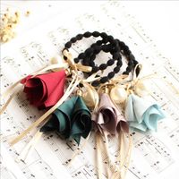 The New Korean Fashion Pearl Fabric Trumpet Flower Hair Band Bow Cheap Scrunchies Wholesale main image 2