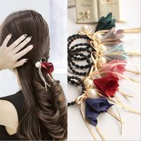 The New Korean Fashion Pearl Fabric Trumpet Flower Hair Band Bow Cheap Scrunchies Wholesale main image 3