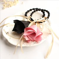 The New Korean Fashion Pearl Fabric Trumpet Flower Hair Band Bow Cheap Scrunchies Wholesale main image 5