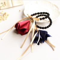 The New Korean Fashion Pearl Fabric Trumpet Flower Hair Band Bow Cheap Scrunchies Wholesale main image 6